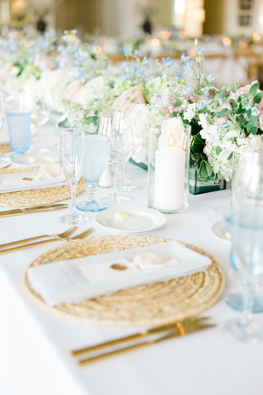 Light blue water goblet rental on a white table