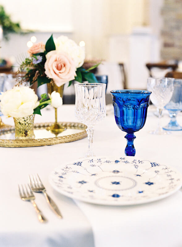 Blue and white dish and cobalt blue stemware rentals at the covenant at Murray mansion 