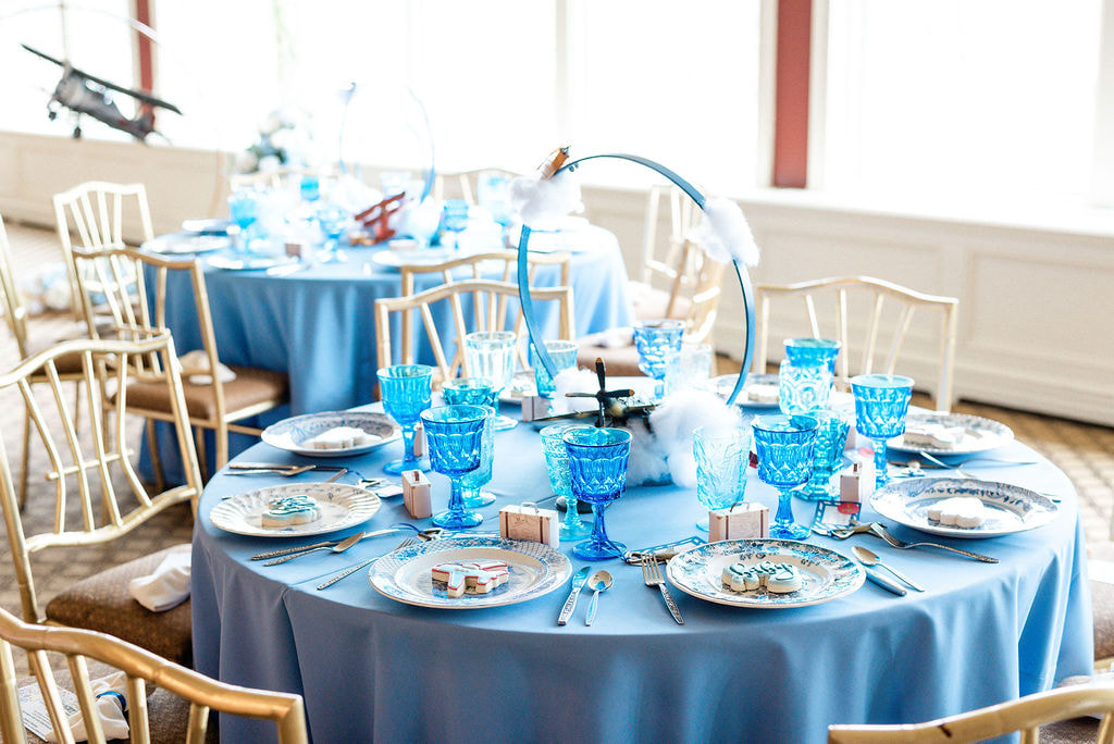 Evanston Golf club baby shower blue table with blue glasses and dishware rentals