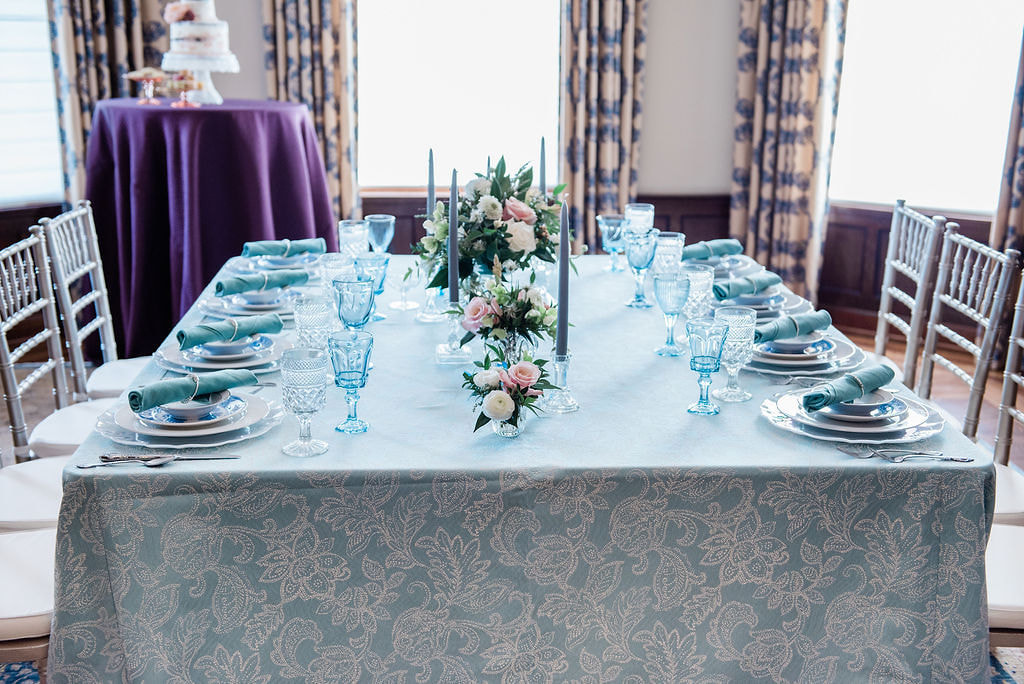 Blue table setting rental at The Barringtons white house in Barrington Illinois