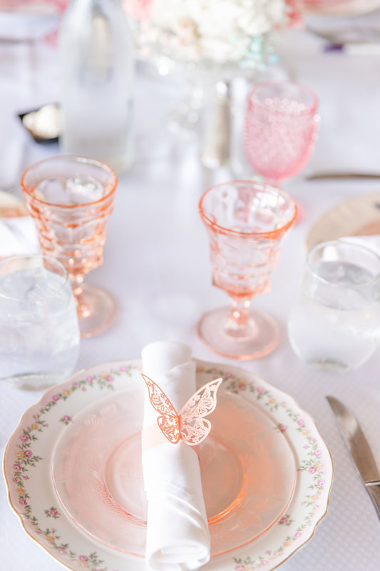 Elegant Floral dishes with pink glassware and butterflies