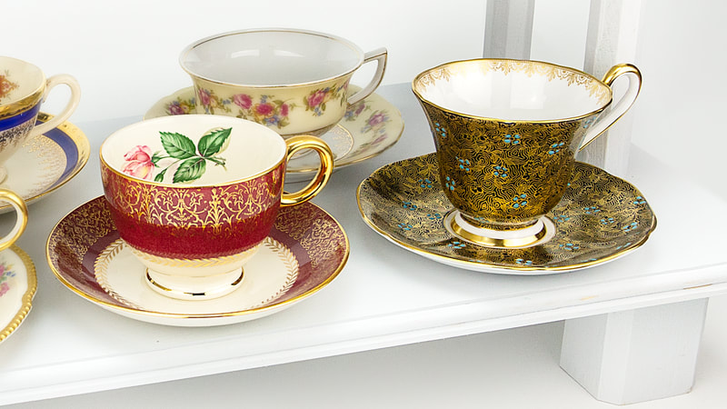 Vintage mismatched Bold and Beautiful teacups and saucers for tea party rentals