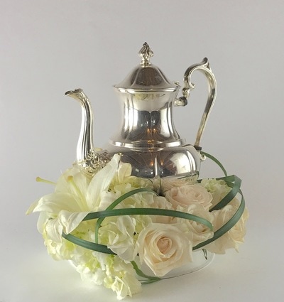 Silver teapot with real flowers in Crystal Lake IL