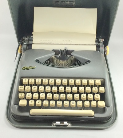 Vintage teal typewriter party rental near Naperville Illinois.