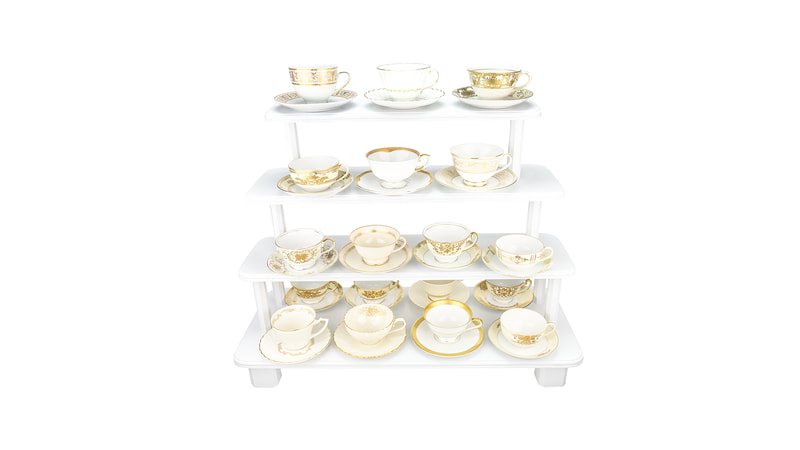 Glorious Gold teacups and saucers on white wooden tiered stand