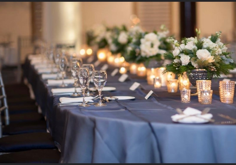 Navy and silver table settings.