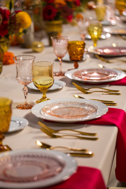 Amber, blush glassware, white lace dinnerware, pink depression glass salad plates, brushed gold flatware rentals.
