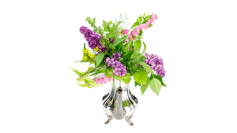 Silver coffee pot with florals