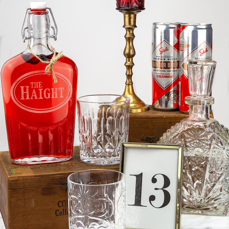 Table numbers, rock glasses, decanters, brass candllesticks with peg cups.